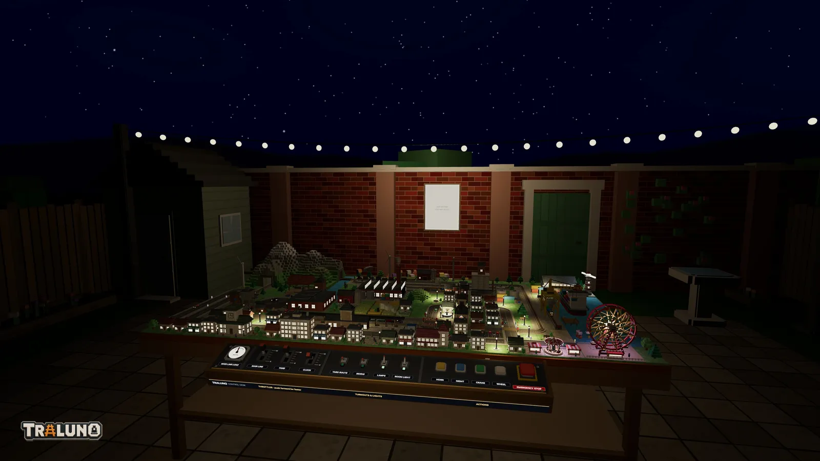 The garden at night from the front of the table: a sky full of small stars above the brick wall, the festoon bulbs lit across the patio, the shed in the corner, and the layout below with its windows and street lamps glowing.