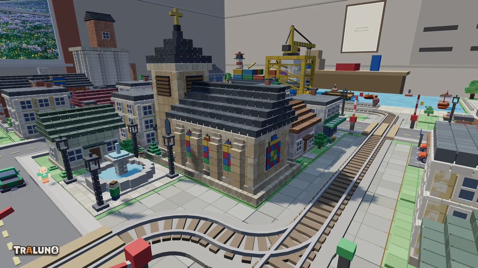 The Town Church by day, built of pale stone blocks with a square tower and a cross, its tall lancet windows down the side and a larger window in the end wall leaded in ruby, cobalt, gold and green, beside a fountain square and a curve of railway track.
