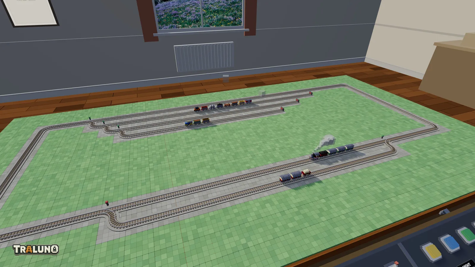 The yard and the passing loop on one oval, with a freight train and a shunter parked in the sidings, a local train waiting in the loop and the Steam Express passing it on the main line.