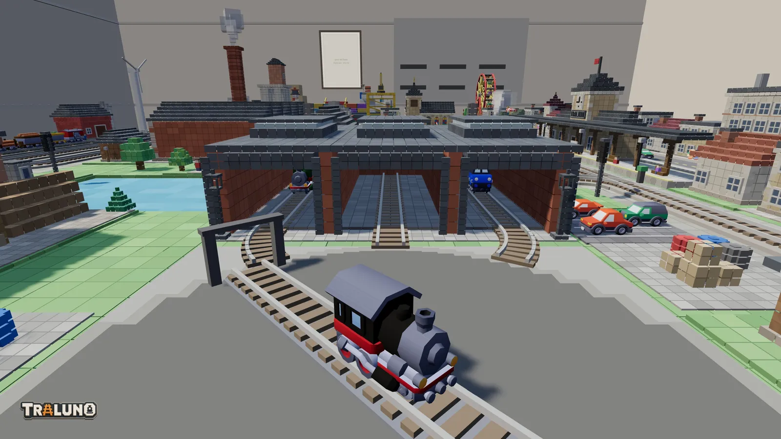 The turntable seen from its stub end, its bridge swinging with a small steam engine aboard, and three approach roads running into the roundhouse, where locomotives stand in the two outer stalls.