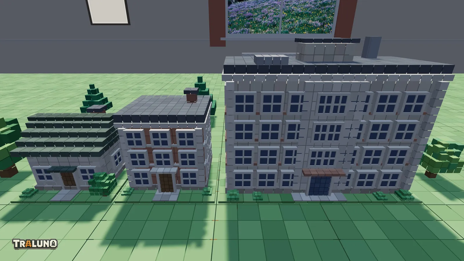 A Cottage, a Townhouse and an Apartment Block standing side by side, square on to the camera, their walls laid in courses of blocks with the seams between them showing.