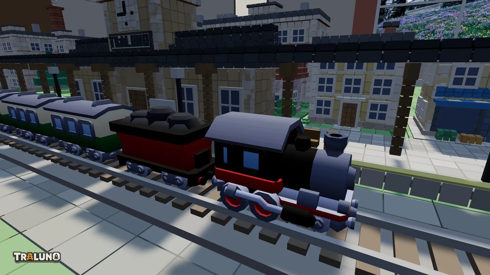 The Steam Express standing at a station platform, its smooth black locomotive, tender and coaches in front of station walls and a townhouse built from visibly stacked blocks.